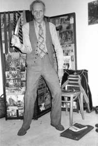 Victor Bockris photograph: William S. Burroughs holding a large knife in his New York apartment, c. 1979